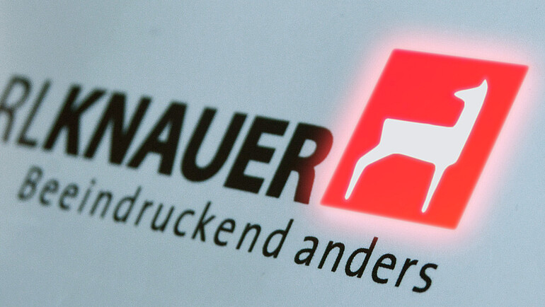 Light-up red Karl Knauer logo