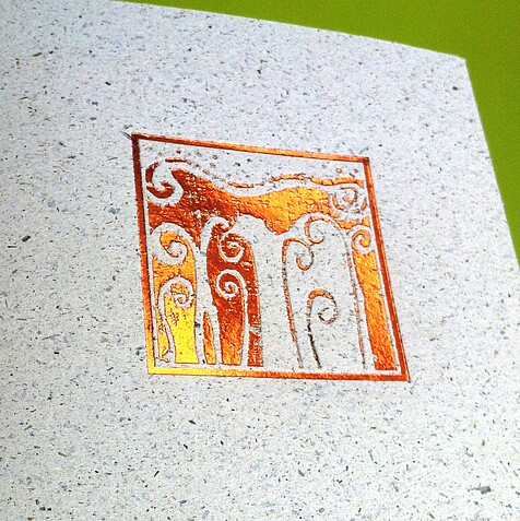 Grass cardboard with bronze-coloured embossing