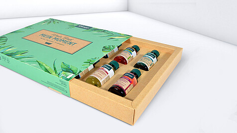 Slider boxes with small bottles inside, close-up