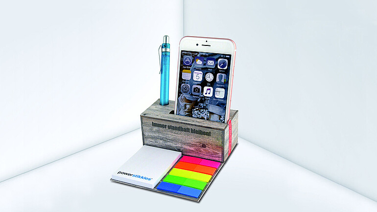 Cardboard note box with mobile phone holder and adhesive markers
