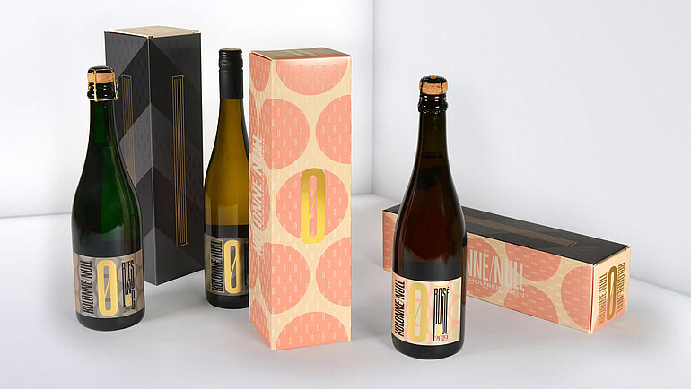 Wine and sparkling wine bottles with gold embossed packaging