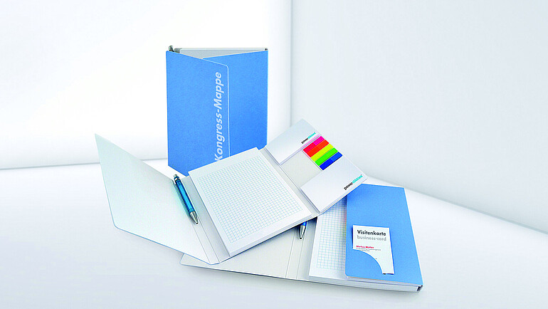 Meeting folder with pad, adhesive notes and ballpoint pen