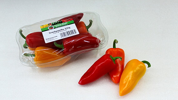 Small peppers in a plastic box