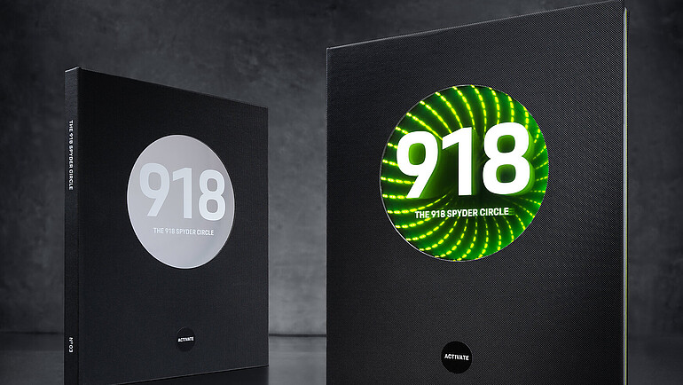 Black narrow folding box with illuminated logo