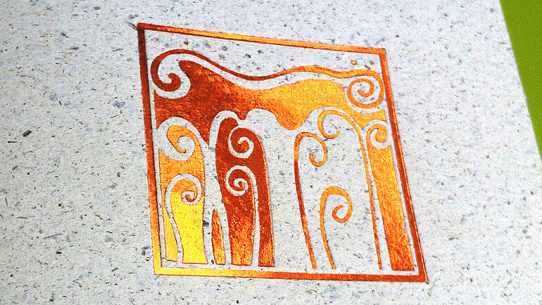 Detailed view of embossed grass cardboard