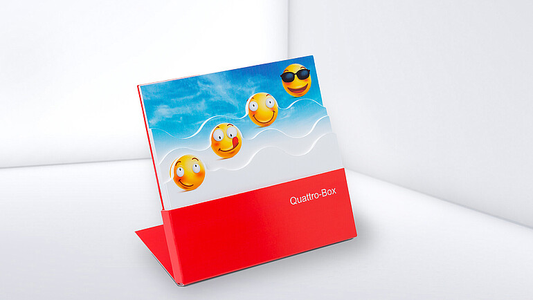 Display cardboard box with four different paper designs