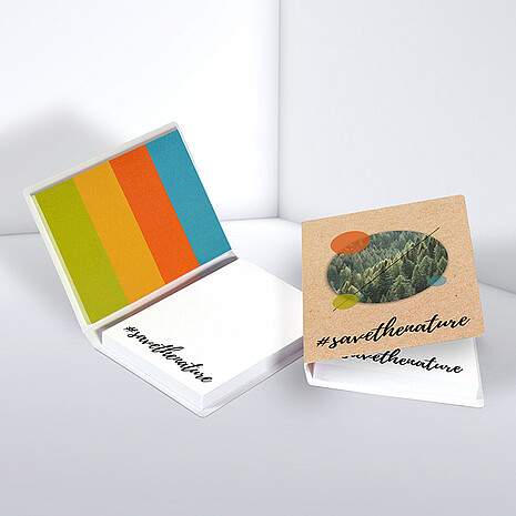 White adhesive note pad with four multi-coloured paper markers in printed cardboard cover
